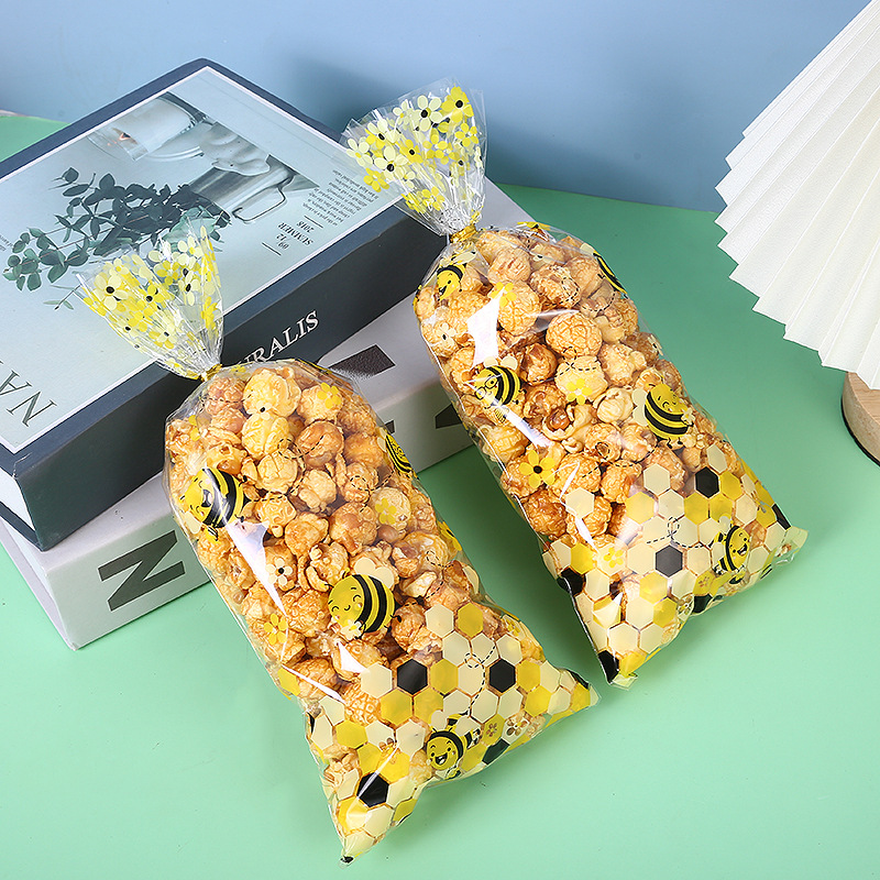 Spot small bee printing bag opp transparent flat bag candy biscuit packaging bag sealing tie silk plastic bag