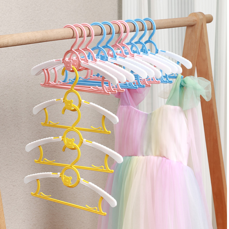 Shake the Sound Explosion of children's non-slip seamless hangers wholesale baby retractable wardrobe hangers clothing store drying racks