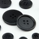Resin Button Two-eye Bread Buckle Black Transparent Button Four-eye Thin Edge Wide Edge White Lining Coat Button Accessories