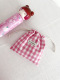 Drawstring pocket-pink grid