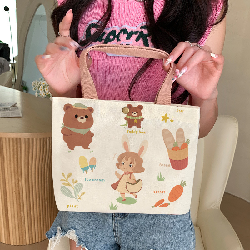Canvas bag 2025 new student female commuter small cloth bag hand bag large capacity a generation of hair