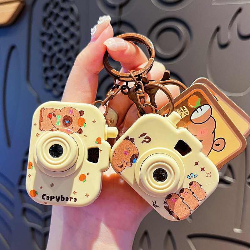 Original Capibala luminous projection camera keychain cute cartoon capybara bag pendant small gift