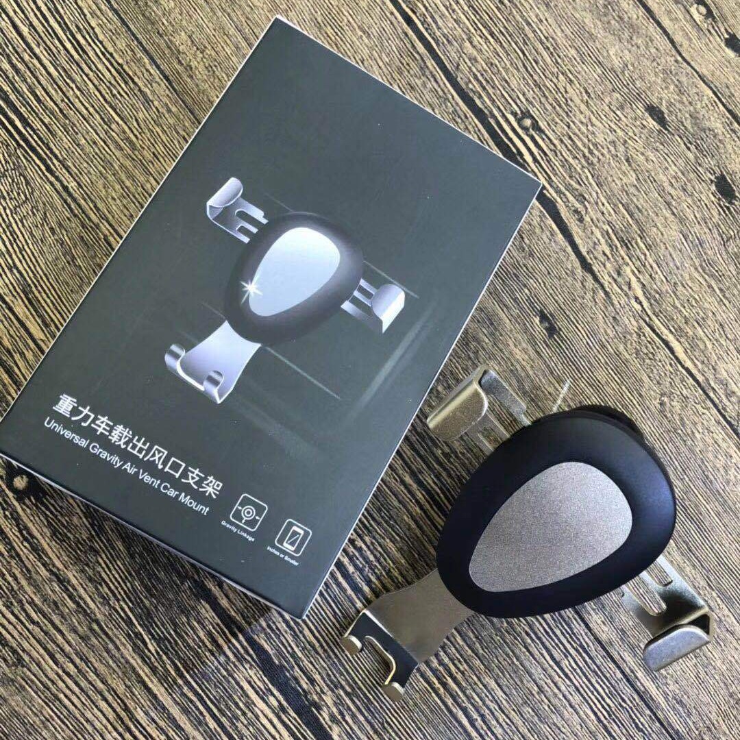 New air outlet car mobile phone bracket car leather Gravity Mobile phone bracket car bracket factory direct sales