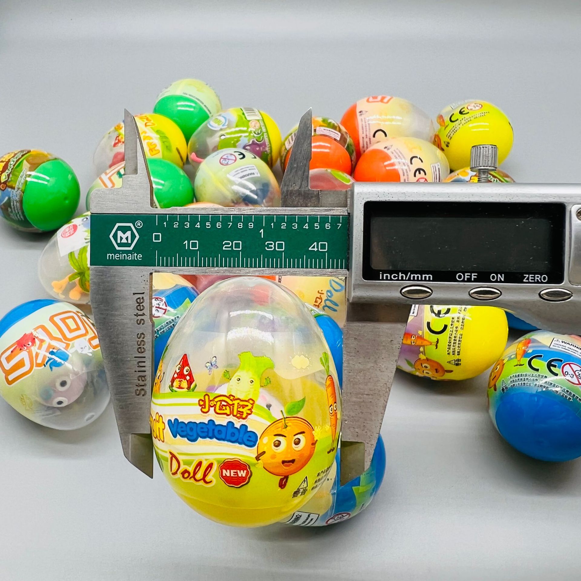 Gashapon toys wholesale coated egg-shaped egg twist 2 yuan egg twist machine doll gift ball twist machine twist