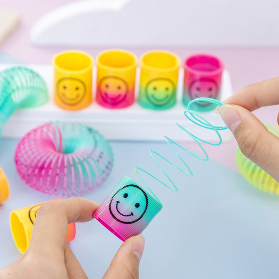 Mini smiling face rainbow ring children's cartoon spring ring folding ring magic kindergarten activities small gifts 2 yuan play