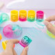 Mini smiling face rainbow ring children's cartoon spring ring folding ring magic kindergarten activities small gifts 2 yuan play