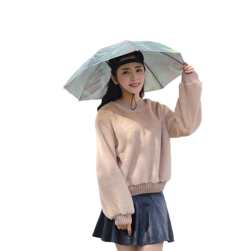 帽子をかぶった傘の卸売りはお茶を採取して釣りをします。|undefined