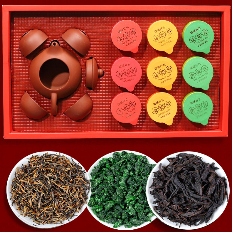 Three big tea Golden Junmei iron guanyin Red Robe Tea 9 small cans free tea set new year gift box