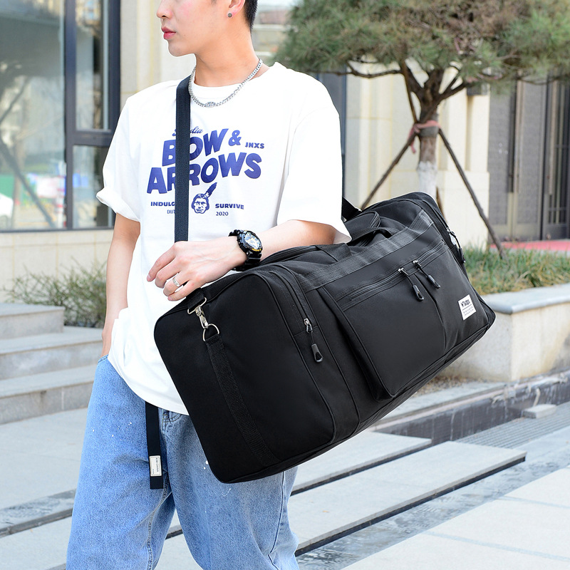 New large capacity foldable portable travel bag male and female students long and short distance travel luggage bag waterproof wholesale