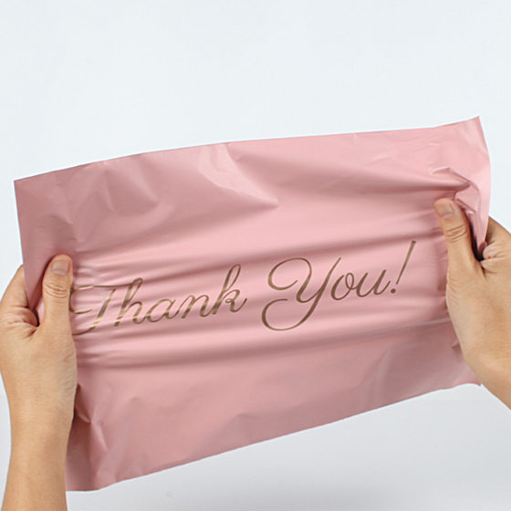 New material pink express bag thickened plastic express self-adhesive packaging bag white e-commerce waterproof packaging bag wholesale