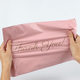 New material pink express bag thickened plastic express self-adhesive packaging bag white e-commerce waterproof packaging bag wholesale
