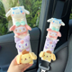 Small dolls 4 white ice silk shoulder pads 1 pair