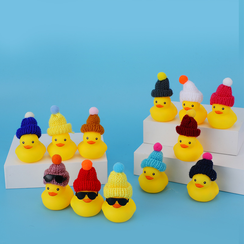 Little Yellow Duck playing water bath toy hat little duck hand playing lemon tea sunglasses vinyl doll duck