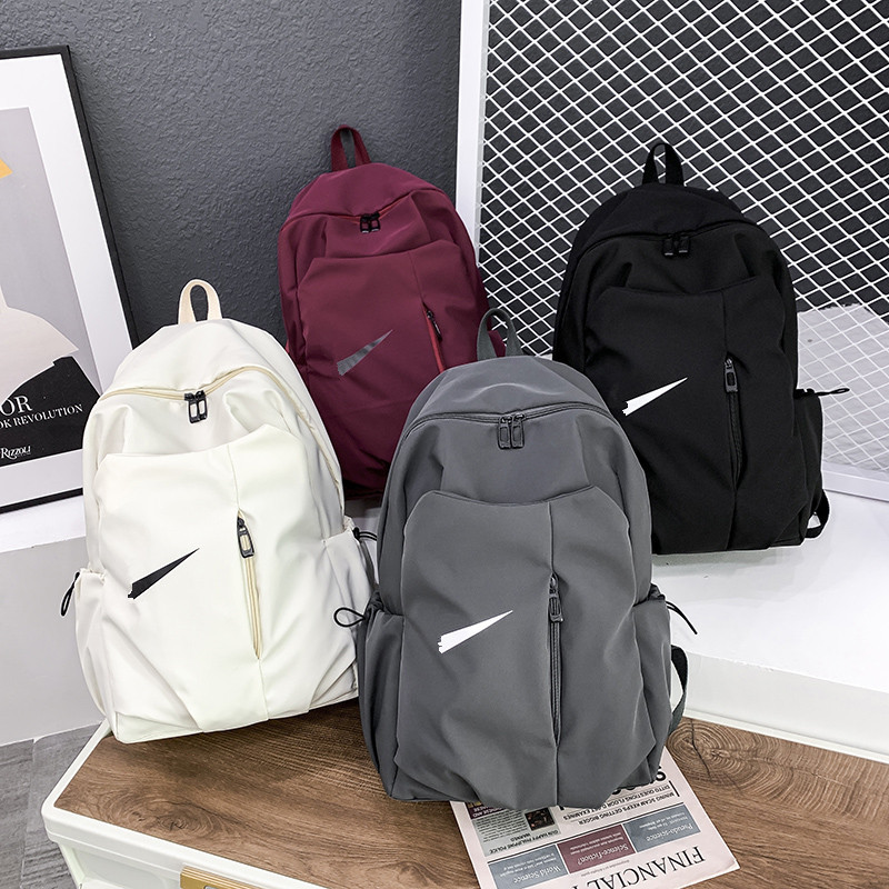 A generation of high school college students bag fashion large capacity leisure shoulder bag NK men's and women's outdoor sports backpack