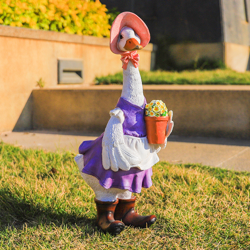 庭の花園の装飾のデスクトップの置物の卸売りの創意の誕生日の贈り物の家庭の装飾品のアヒルの樹脂の工芸品