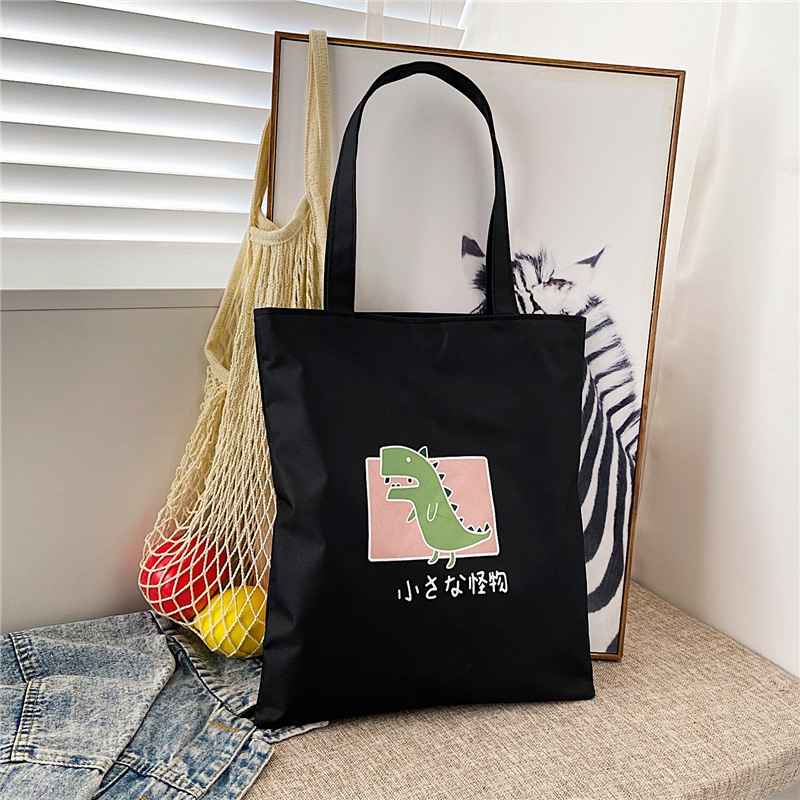 Canvas bag with INS creative design, single-shoulder and hand-held bag, Korean-style, literary and artistic, student study bag.