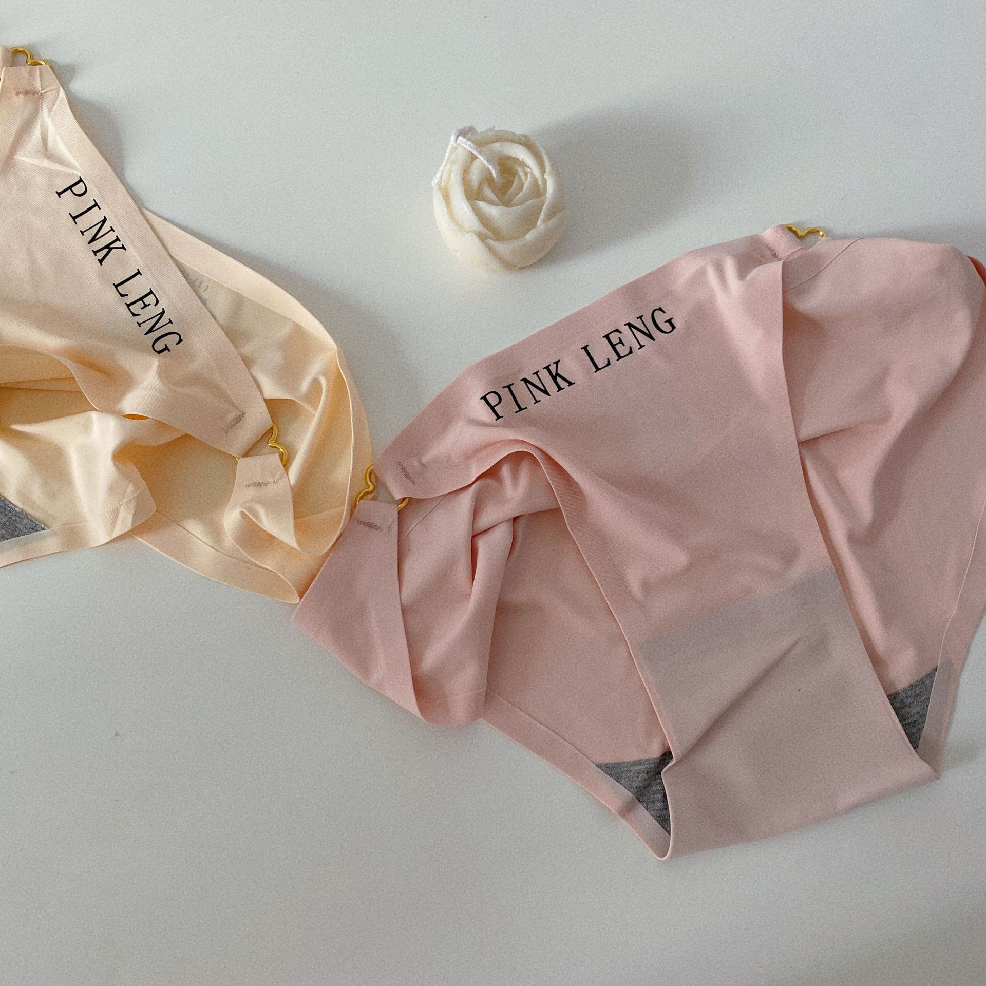 Interlocking ~ New Japanese simple ice silk underwear for women, low-waisted, solid color, traceless girl's briefs, pure cotton crotch