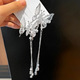 One silver tassel