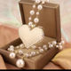 1. White bead chain love tassel