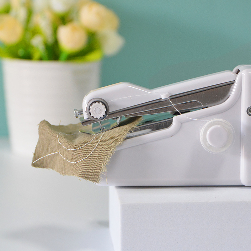 Handheld portable sewing machine handy stitch household multifunctional mini electric sewing machine wholesale