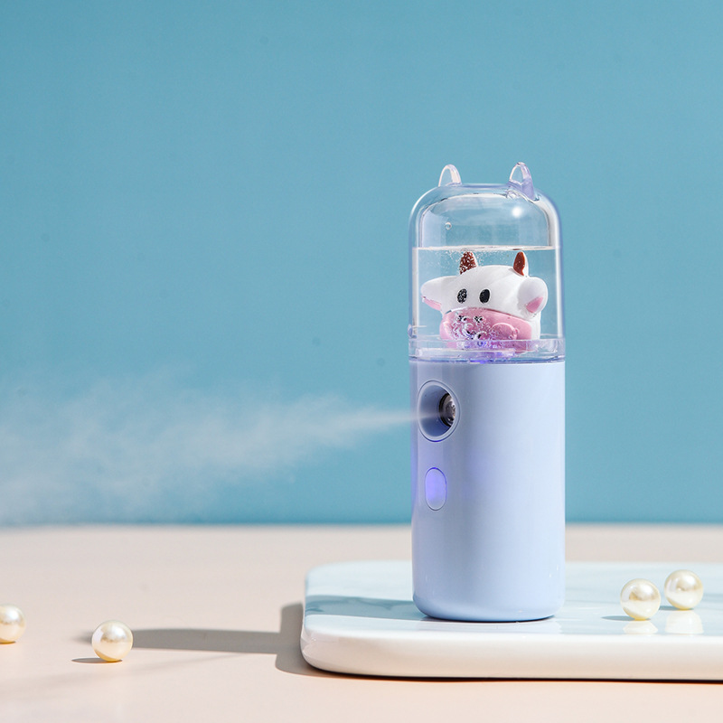 New cartoon cute pet hydrating instrument alcohol disinfectant spray instrument handheld usb charging mini humidifier manufacturers