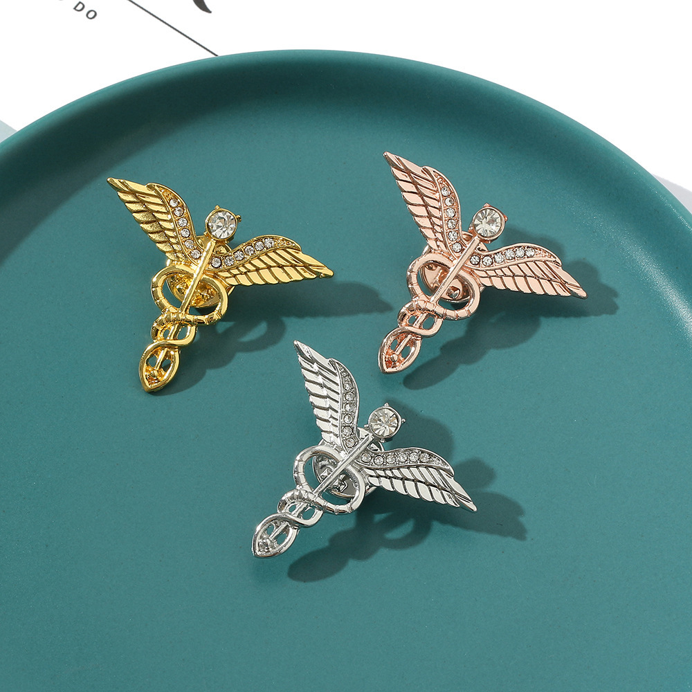 Foreign trade jewelry European and American personality angel wings brooch trend corsage accessories clothing badge factory direct sales