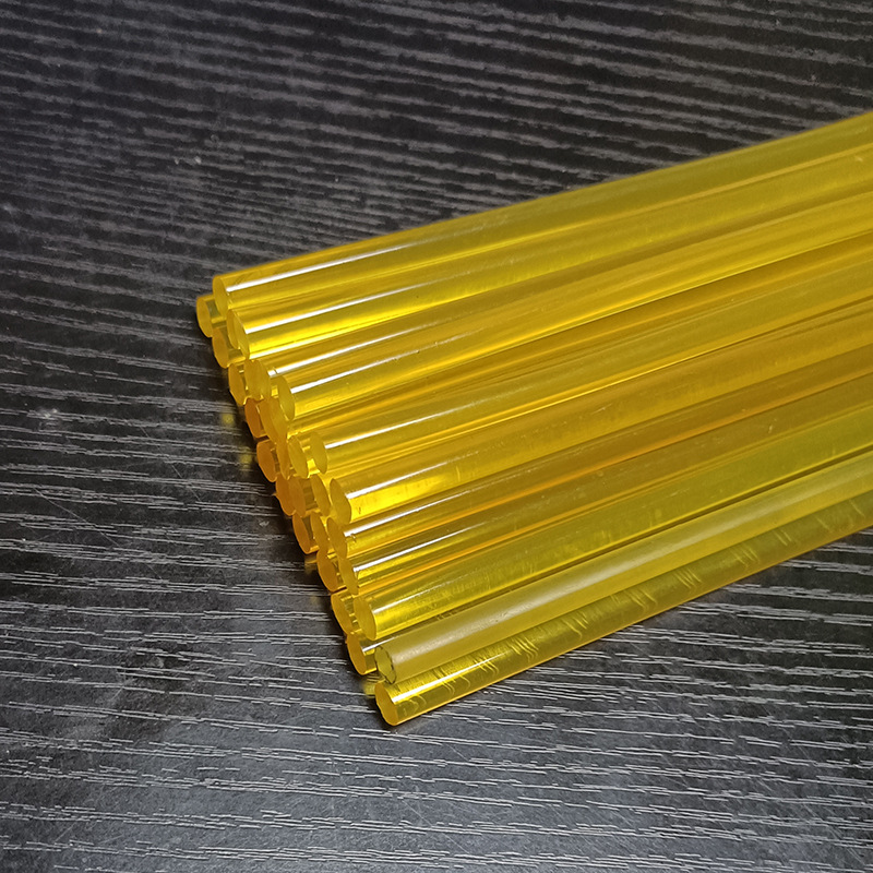 Spot wholesale golden yellow high transparent hot melt glue stick 7mm jewelry metal high viscosity thermoplastic resin adhesive
