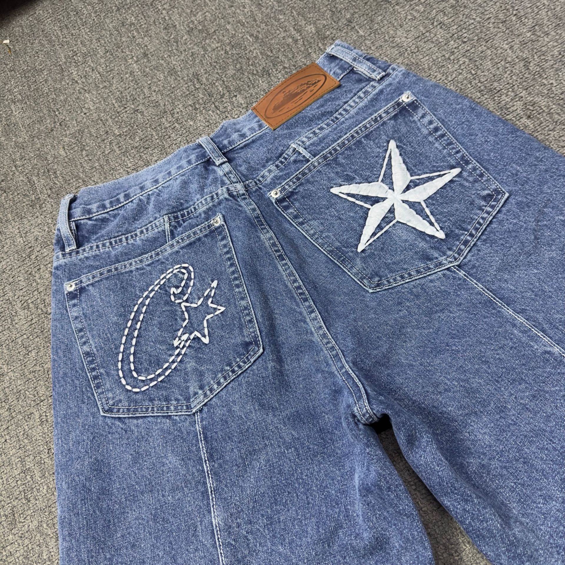 Cross-border 2024 Devil Island five-pointed star LOGO embroidery heavy industry washing men's and women's same casual loose Denim middle pants