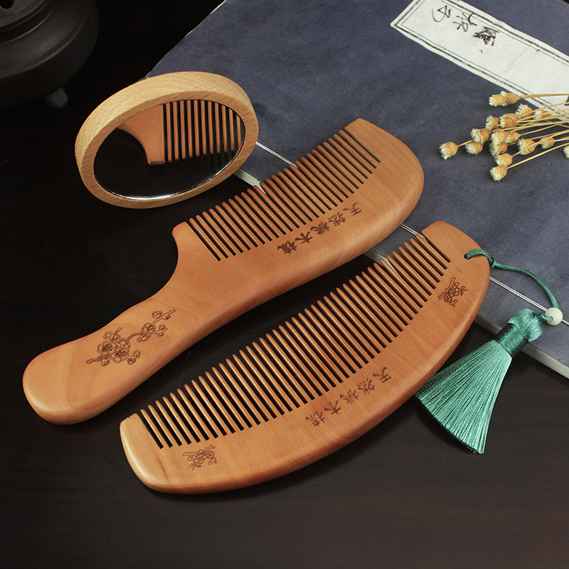 Large boutique thick peach wood comb portable hair comb makeup comb hair massage electrostatic comb lettering factory direct sales