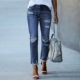 2021 Amazon wish cross-border independent station new women's tight solid color white-on denim ripped jeans