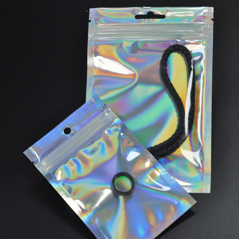 Laser flat bottom bone bag Ziplock bag translucent Yin and Yang sealed bag mobile phone shell jewelry packaging bag spot