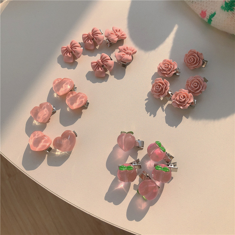 ピンクの柔らかい妹のかわいいシリーズの水蜜桃のヘアピンのヘアピンの甘い美しい風のツバキの花の縁は蝶結びの髪飾りを挟みます。|undefined