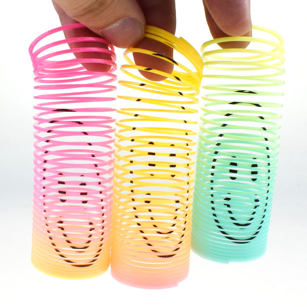 Children's colorful spring ring mini smiling face rainbow ring colorful ring elastic ring ground Prize toy cross-border supply