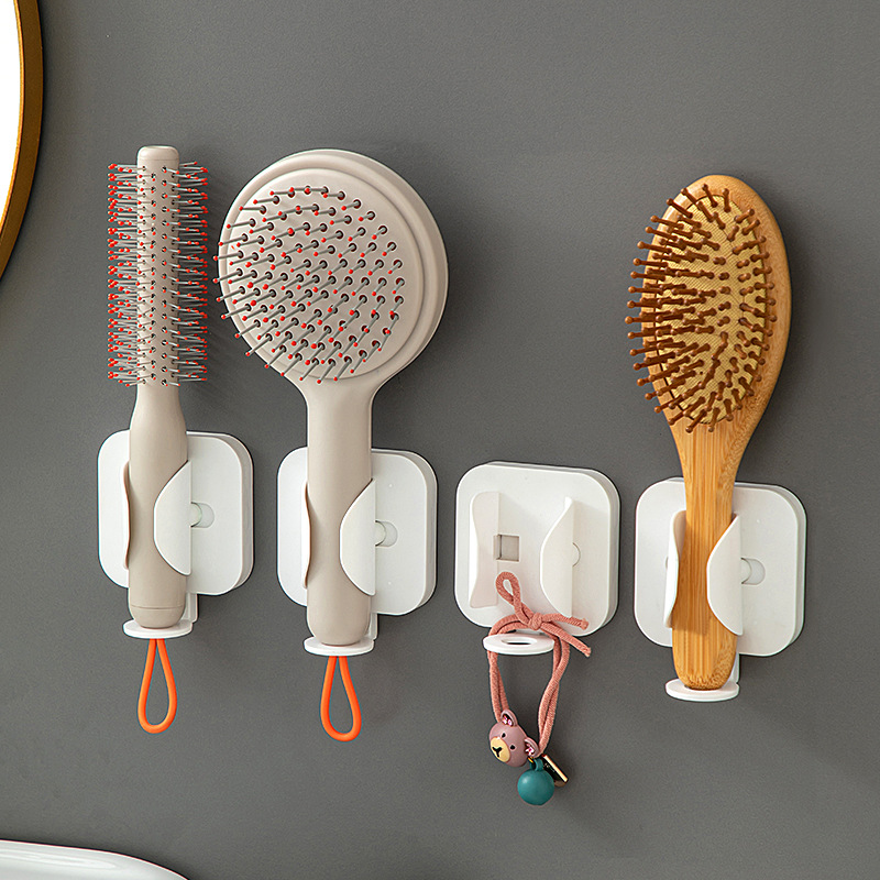 New wall-mounted gravity induction retractable electric toothbrush rack bathroom multi-function comb hair curler rack