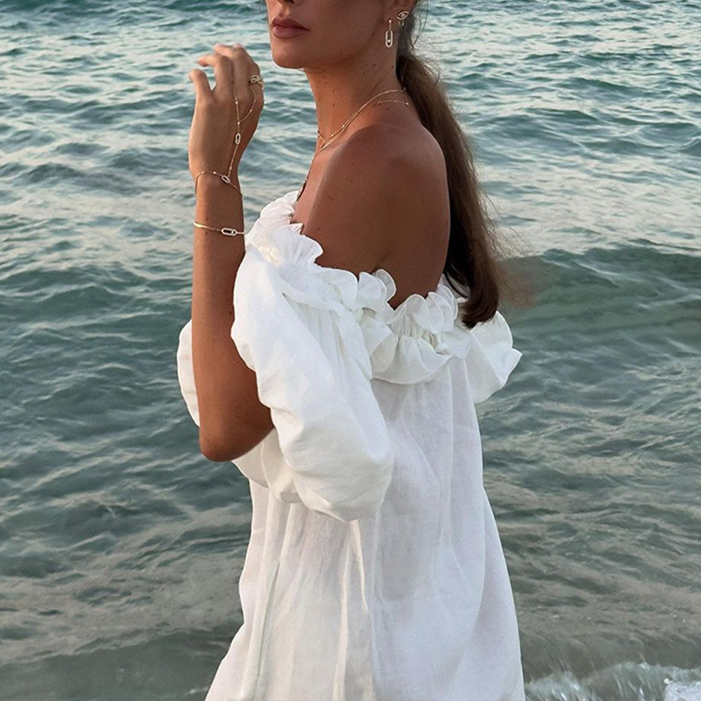 Cross-border 2024 spring and summer European and American women's off-shoulder sexy bubble sleeve solid color lace holiday beach dress